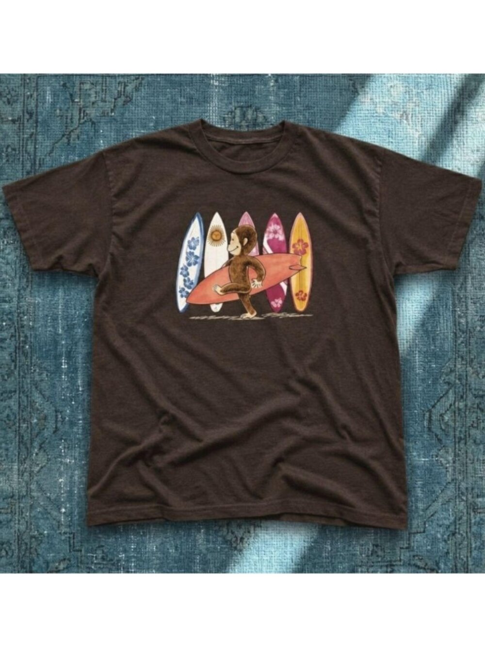 Brown Curious George monkey surfing